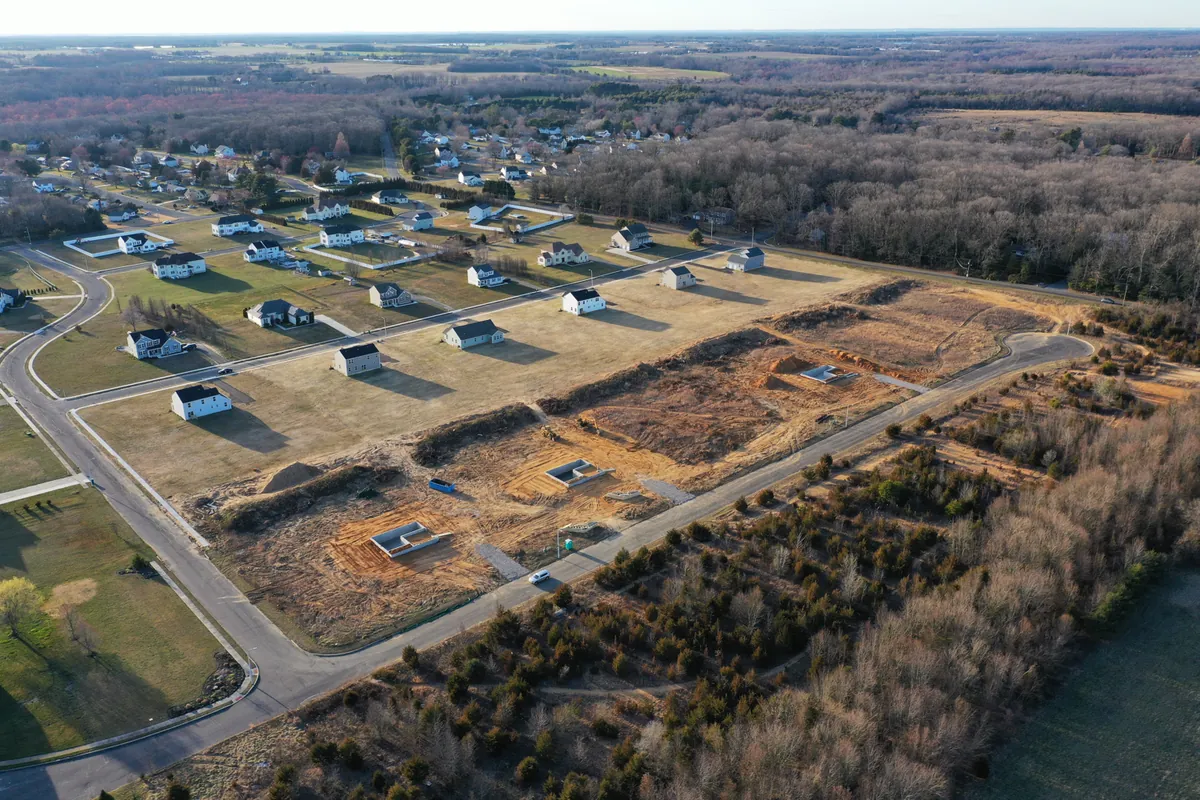 The Reserve at Button Mill at golden hour, from the air